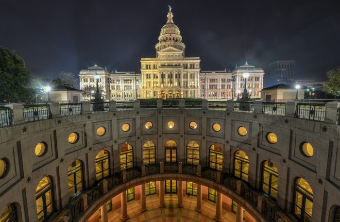 The Texas State Capitol Building Extension, Night The Texas State Capitol Building with a view of the modern extension in downtown Austin at Night. The building was built in 1882-1888 of distinctive sunset red granite.